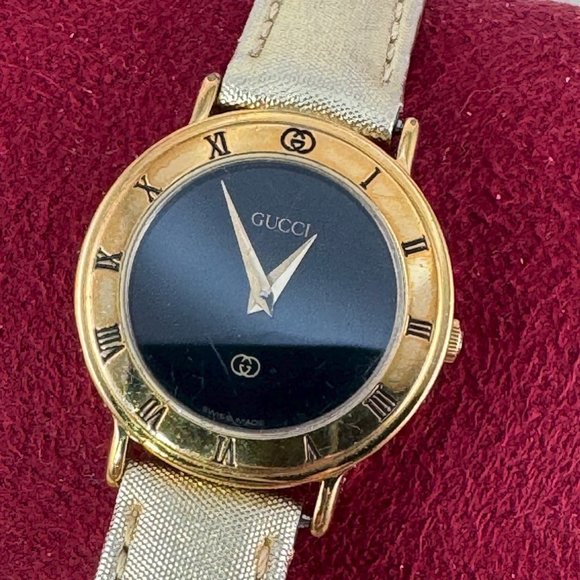 Vintage Swiss Quartz GucciWatch Roman Numeral Bezel Black Face Gold Strap